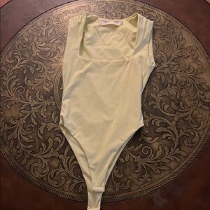 Elegant Light Yellow Bodysuit